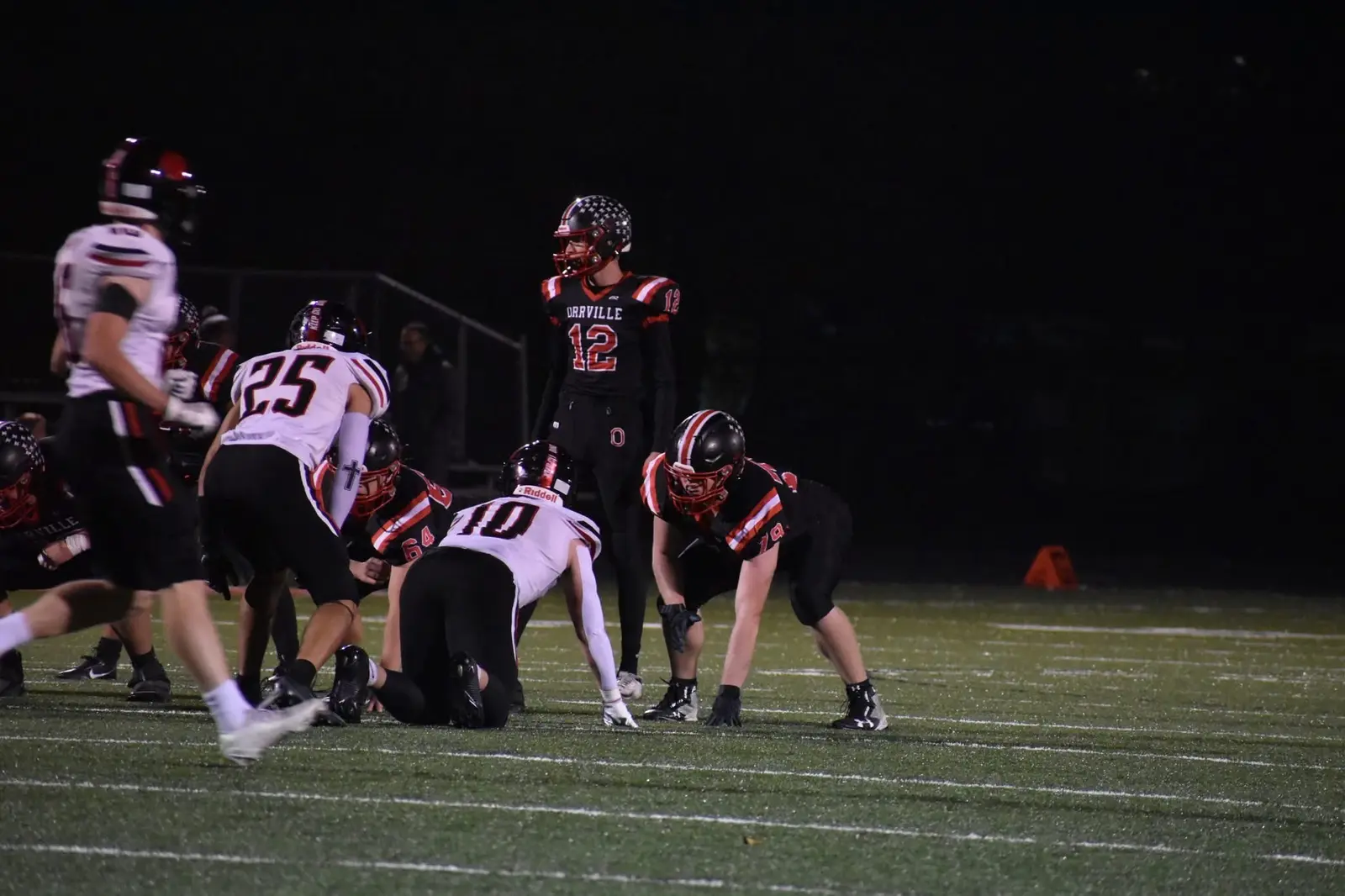 Owen Landis playing football for Orrville High School